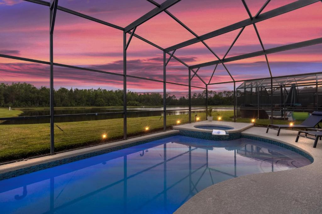 Kissimmee Villa | Lake View Vacation Home with Pool and Game Room Near Disney Parks