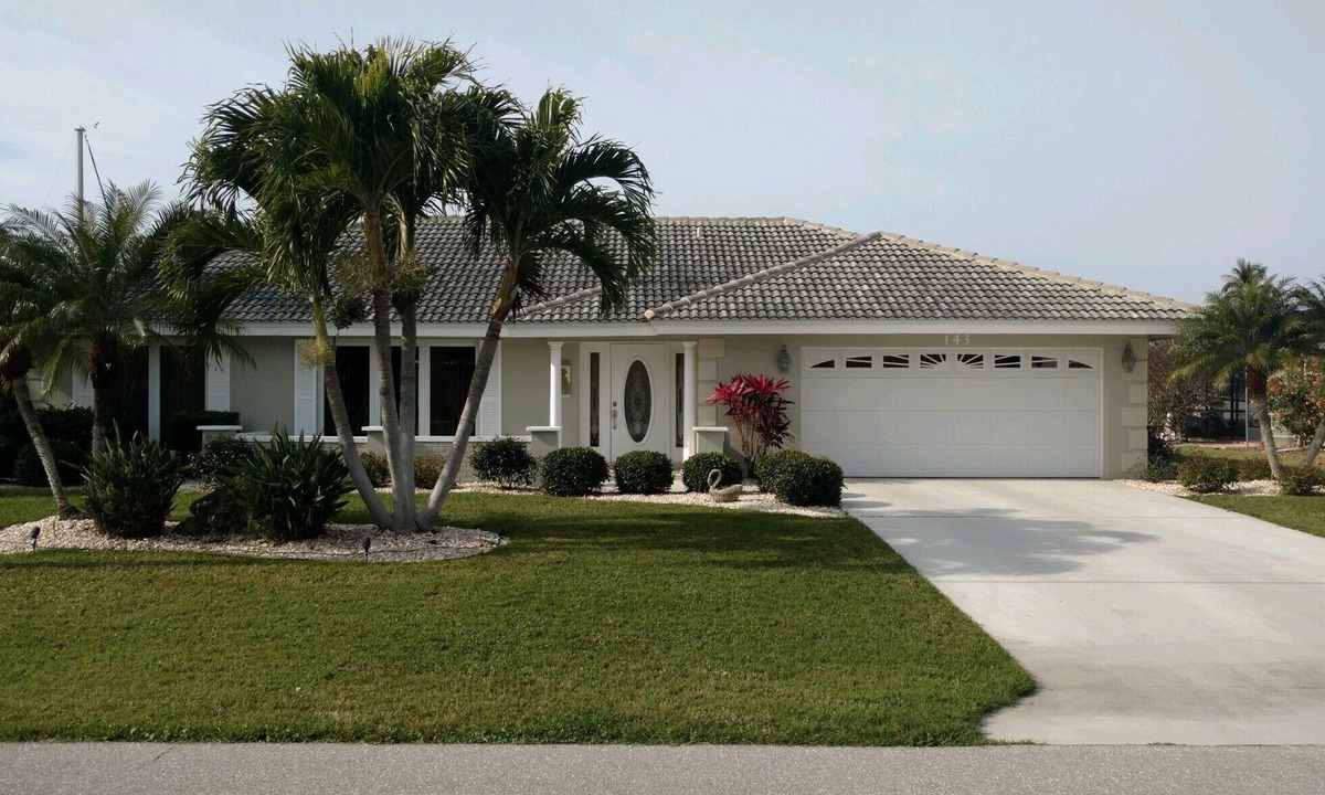 Punta Gorda House | Pool house on a lagoon with sunset view