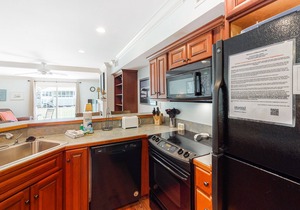 First-floor, dog-friendly condo in golf course setting with back deck & W/D