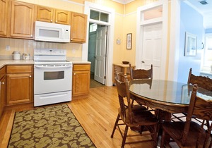 Second-Floor Suite w/ Covered Porches & Full Kitchen - Steps from Dining & Shops