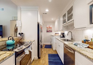 Updated Harbour Town Hideaway with Pool & Balcony | Walk to Shops & Golf