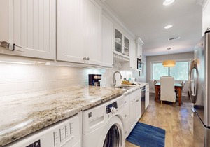 Updated Harbour Town Hideaway with Pool & Balcony | Walk to Shops & Golf