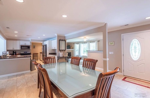 North Forest Beach House | 11 Sandpiper St - Sandpiper Oasis Large Pool and Putting Green