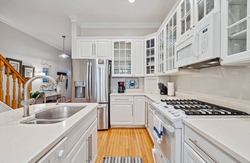 Waters Edge House | 110 Waters Edge! Luxury River Views with Community Pool, Screen Porch