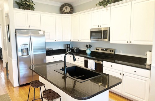 Waters Edge House | 120 Waters Edge! Community pool, screen porch, easy walk to beach, 2 blocks from Center St.