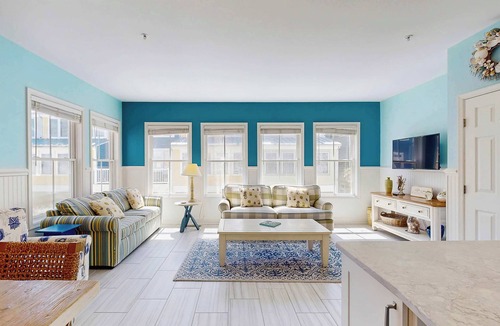 Sunset Island House | 4-story townhome with resort pools, beaches, water access, & great location