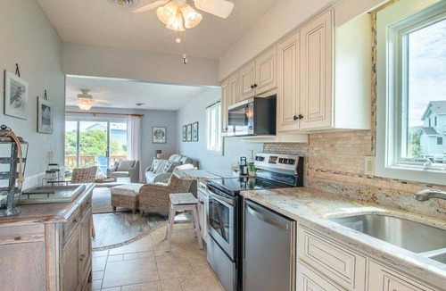 Sea Acres House | 4210- Changes in Latitude, Georgetown Sands condo, outdoor shower, with community pool and tennis