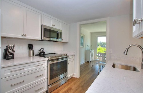 South Beach House | Beautifully Updated Home! Water Views and Walking Distance to the Salty Dog!