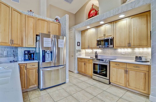 Pelican House | Blue Water 1022 Cape Coral Gulf Access Pool & Spa Home w/large Dock a. Tiki Hut