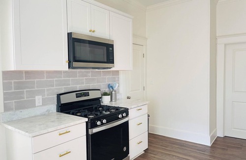 Crosstown House | Chic Crosstown Bungalow with large fenced backyard!