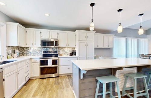 Summerwind Villas Condo | Coastal retreat with fireplace, AC, grill, lagoon views and close to beach