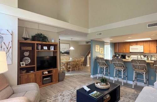 Ocean Ridge Condo | Coastal townhome with riverfront views, deck, & W/D - pool and athletic courts