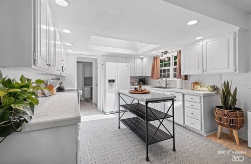 Rogers Cottage | Creekside Oasis w/Pool & Hot Tub near Beaver Lake