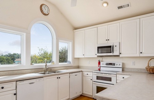 Monteray Shores House | Dog-friendly sound-front home with pool, fireplace, game room & washer/dryer