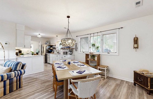 Edisto Island House | Edisto Beach cottage with a screened in porch & nestled among old live oaks