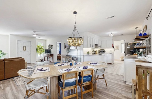 Edisto Island House | Edisto Beach cottage with a screened in porch & nestled among old live oaks