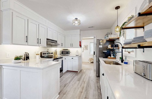 Edisto Island House | Edisto Beach cottage with a screened in porch & nestled among old live oaks