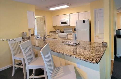 Shipyard Plantation Cottage | Exclusive Escape: Spacious Home in Gated Shipyard Community, with bikes to ride