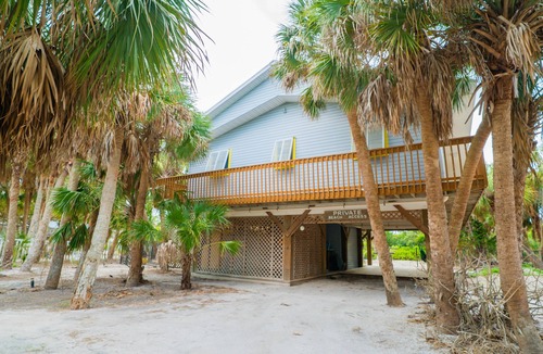 Palm Island House | Exclusive Palm Island 2br/2ba Home with Pool, Hot Tub, Dock, & 7-Mile Beach