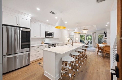 West Beach House | High-End Greenslake Cottage with Pool Access, Lagoon Views - One of the BEST!