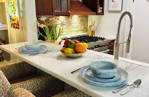 Ansonborough Condo | Historic 1807 Downtown Charleston with Parking, Patio & Fireplace