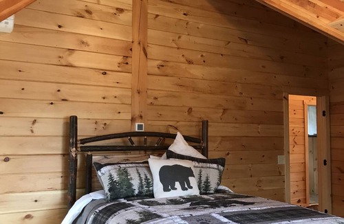 Meredith Cabin | Luxury Log home steps from private beach in Meredith on Lake Winnipesaukee.
