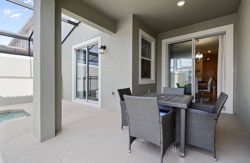 Kissimmee Ski Chalet | Modern Townhouse 4Bed/3Bath/Pool/5Min Disney