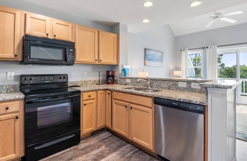 Bermuda Bay House | Monkey Business: Townhome w/ Community Pool & Lazy River | Dogs Welcome!