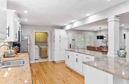 West Beach Cottage | New listing, community pool, easy beach access!