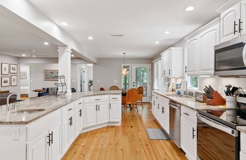 West Beach Cottage | New listing, community pool, easy beach access!