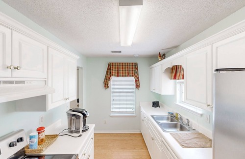 National Hills House | Newly furnished townhome near Augusta National with 85' TV