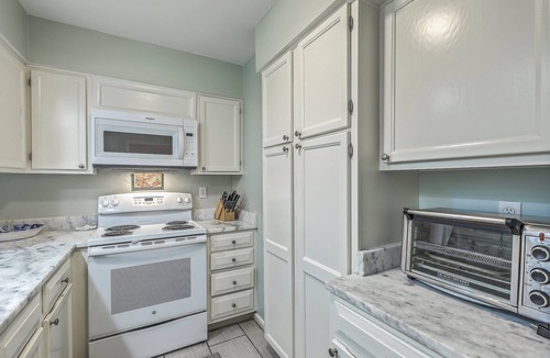 Tarpon Pond Cottage | Ocean Winds Escape by Sandpiper | Near Beach