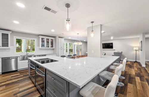 Amelia City House | Pet Friendly | 5000 Sq Ft | 2 Living Rooms & 2 Kitchens | Optional Pool Heat | Firepit | Fenced Yard