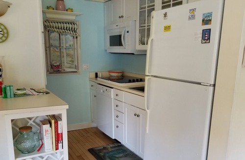 Night Heron Villa | Pet Friendly With Walk to Beach! Private, Quiet Retreat! Access to Pool