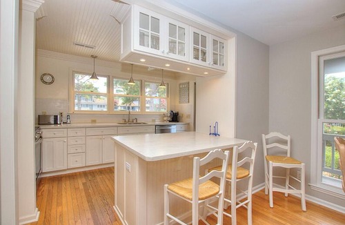 South Beach House | Sea Pines beach home with screened porch and sundeck. Walk to the Salty Dog!