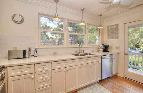 South Beach House | Sea Pines beach home with screened porch and sundeck. Walk to the Salty Dog!