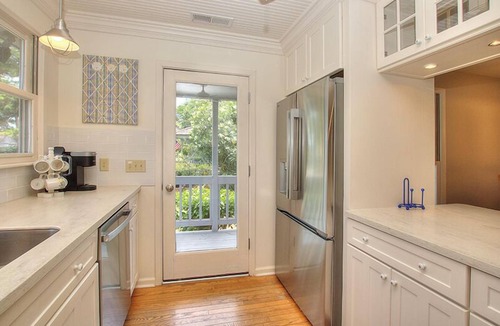 South Beach House | Sea Pines beach home with screened porch and sundeck. Walk to the Salty Dog!