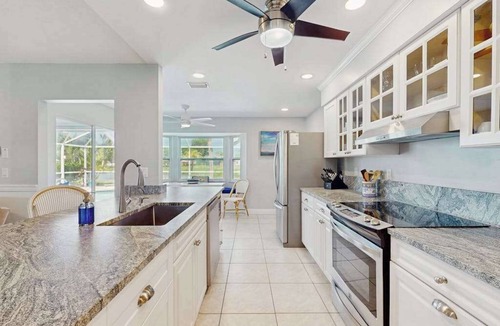 Englewood East House | Snowbird-friendly home with private pool, water views, patio & sunroom
