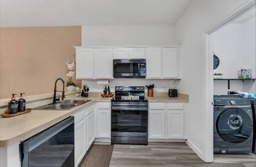 Sandy Ridge House | Spacious 4-bedroom Home in Davenport with Pool Heat Close to Disney!