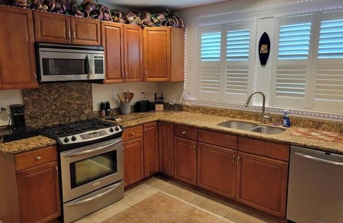 Chalmette House | Stylish Two-Bed Home with Patio, Sunroom Gym