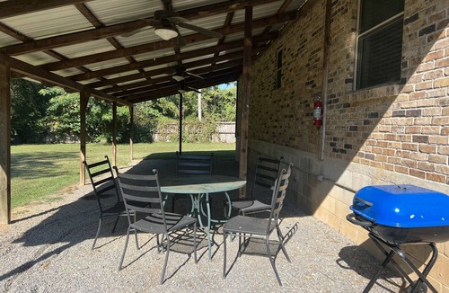 Mount Ida House | Two bedroom House with fenced in yard, covered patio area, located at the Joplin Inn at the entrance to Mountain Harbor, just 1 1/2 miles from Lake Ouachita. by RedAwning