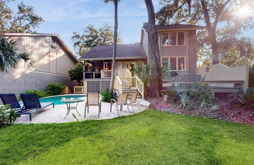 Shipyard Plantation House | Two King Bed Suites/Dog-friendly gem with pool, game room & golf course views - walk to beach