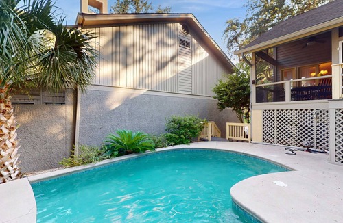 Shipyard Plantation House | Two King Bed Suites/Dog-friendly gem with pool, game room & golf course views - walk to beach