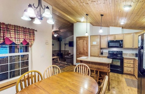 South Fork Cabin | Waterfront cabin with mountain view, wood stove, private hot tub, & WiFi