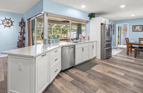 Bal Harbour House | Waterfront Oasis with Pool, Dock, Kayaks, and Bar |4BR Pet-Friendly |Pirates Den at Apollo Beach