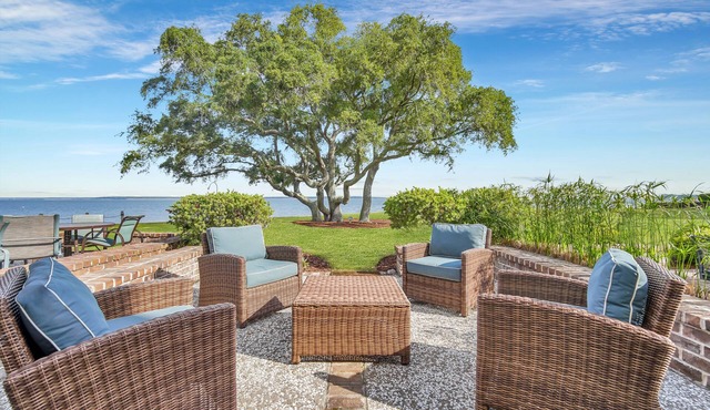 703 Schooner Court sleeps 7 with Calibogue sound views in Harbour Town. Book your stay today!