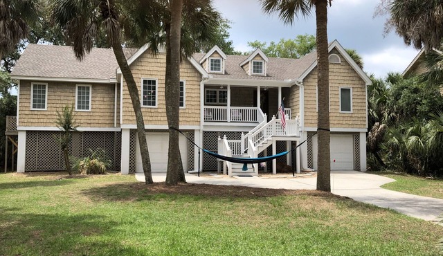 A serene cottage, ISLAND PSALMS, on the Green with-Golf Cart and Amenity Cards.
