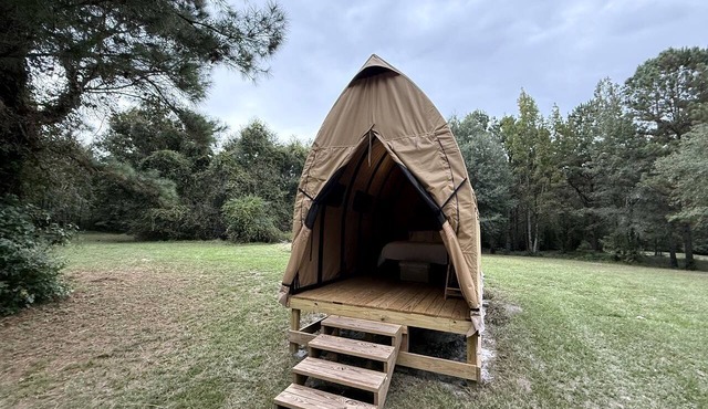 Canvas Cabin with Fire Pit for a Cozy Glamping Escape in Branchville, South Carolina
