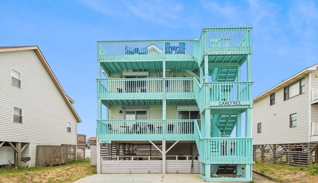 Carefree in Kitty Hawk, NC! Just a few steps from direct beach access.