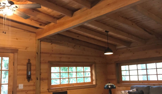 Cozy cabin in secluded forest with deck on creek. Full kitchen. 900 square feet.
